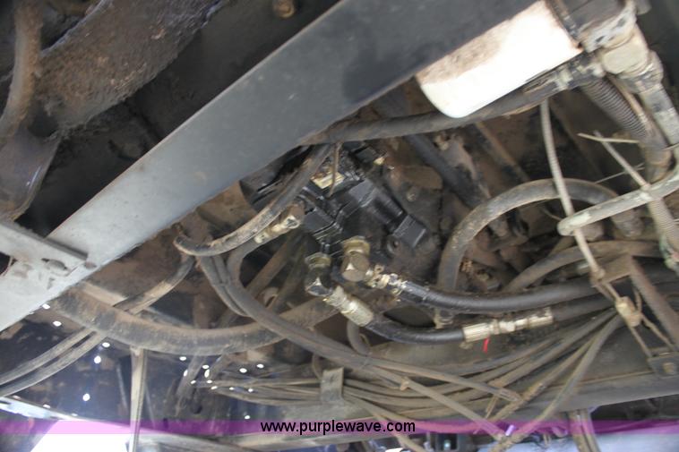 image for item H7378 2000 Mac Don 9350 Turbo swather