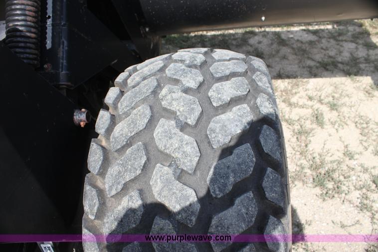 image for item H7378 2000 Mac Don 9350 Turbo swather