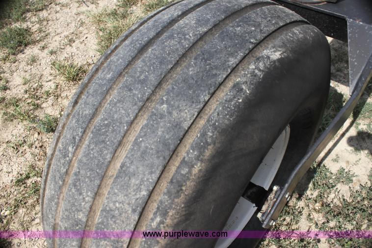 image for item H7378 2000 Mac Don 9350 Turbo swather