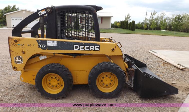 image for item I7694 2005 John Deere 317 skid steer