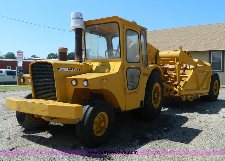 image for item AD9220 John Deere 760A paddle scraper