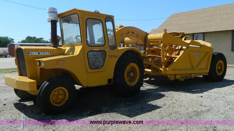 image for item AD9220 John Deere 760A paddle scraper