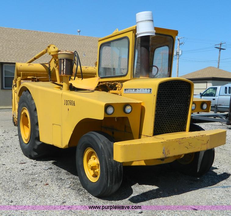 image for item AD9220 John Deere 760A paddle scraper