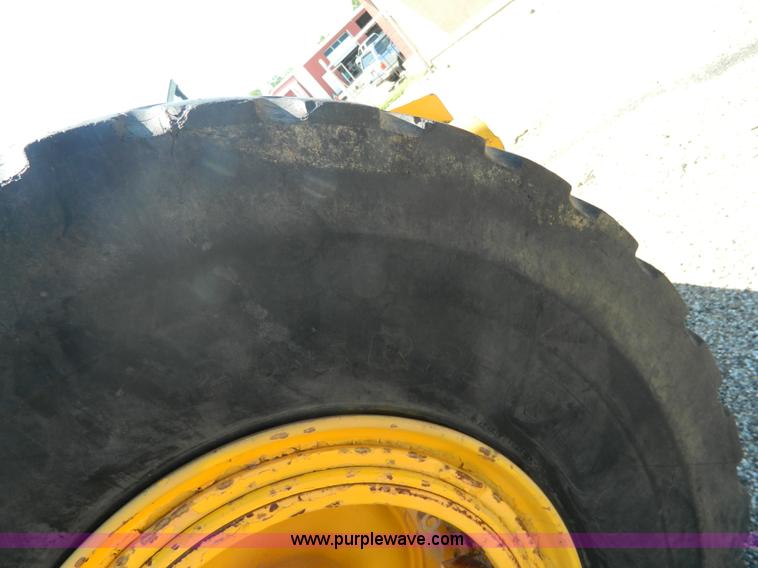 image for item AD9220 John Deere 760A paddle scraper