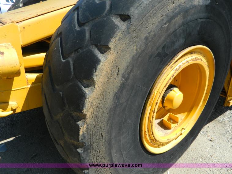 image for item AD9220 John Deere 760A paddle scraper