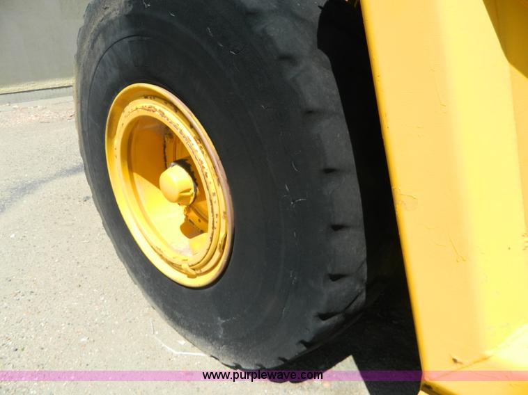 image for item AD9220 John Deere 760A paddle scraper