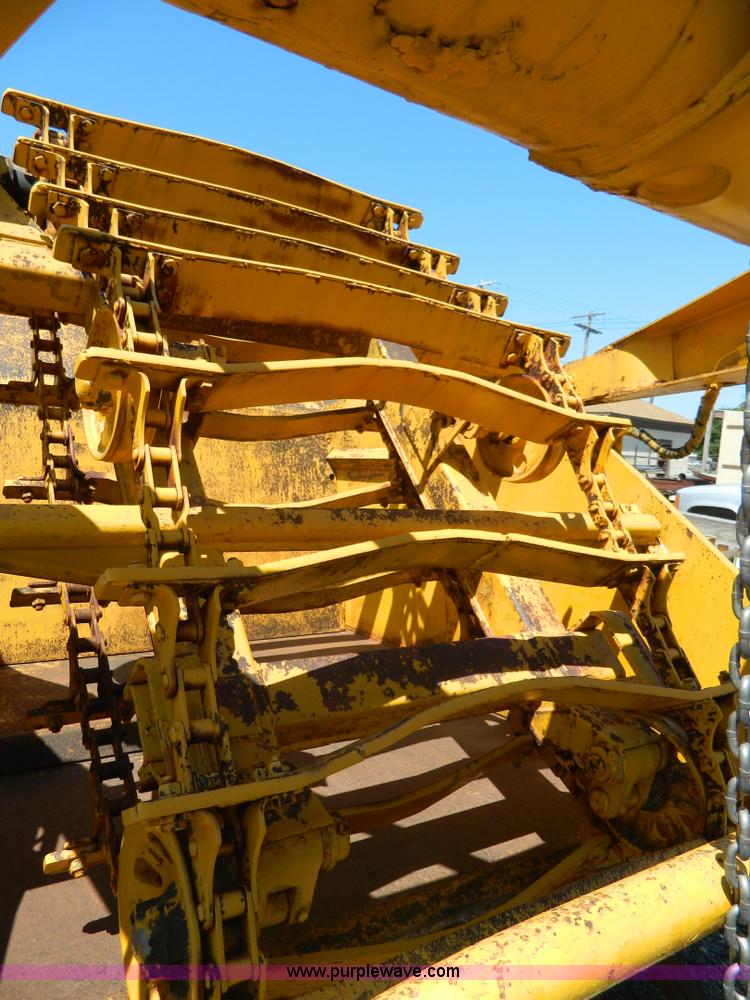 image for item AD9220 John Deere 760A paddle scraper