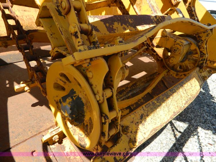 image for item AD9220 John Deere 760A paddle scraper