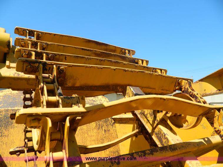 image for item AD9220 John Deere 760A paddle scraper