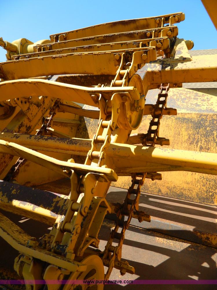 image for item AD9220 John Deere 760A paddle scraper