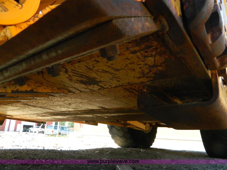 image for item AD9220 John Deere 760A paddle scraper