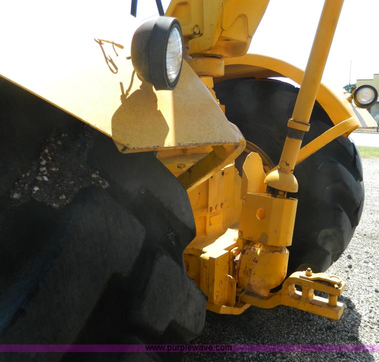 image for item AD9220 John Deere 760A paddle scraper