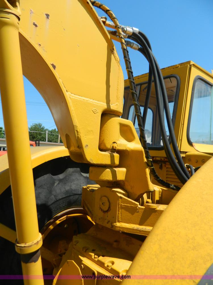 image for item AD9220 John Deere 760A paddle scraper