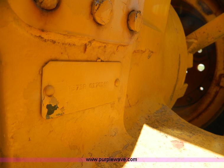 image for item AD9220 John Deere 760A paddle scraper