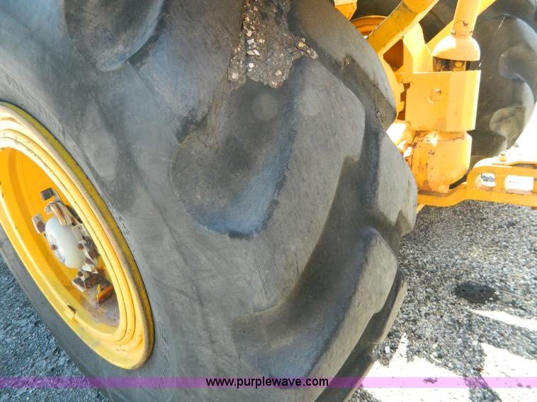 image for item AD9220 John Deere 760A paddle scraper