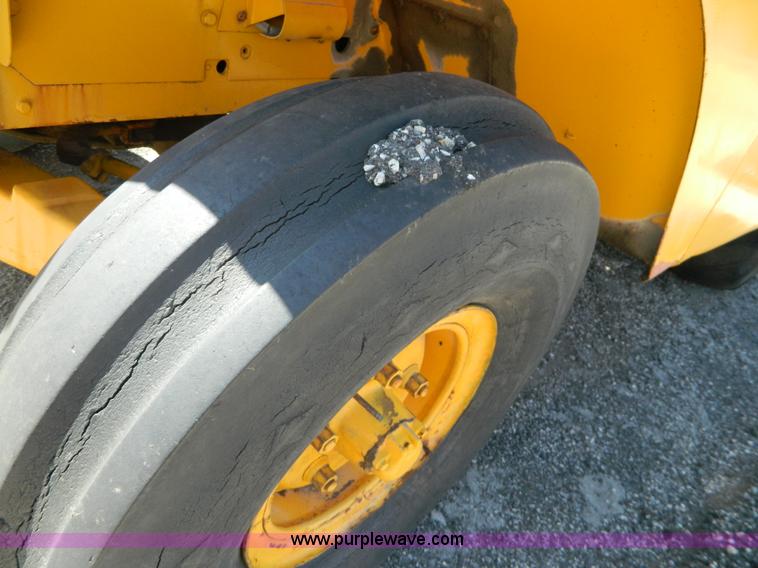 image for item AD9220 John Deere 760A paddle scraper