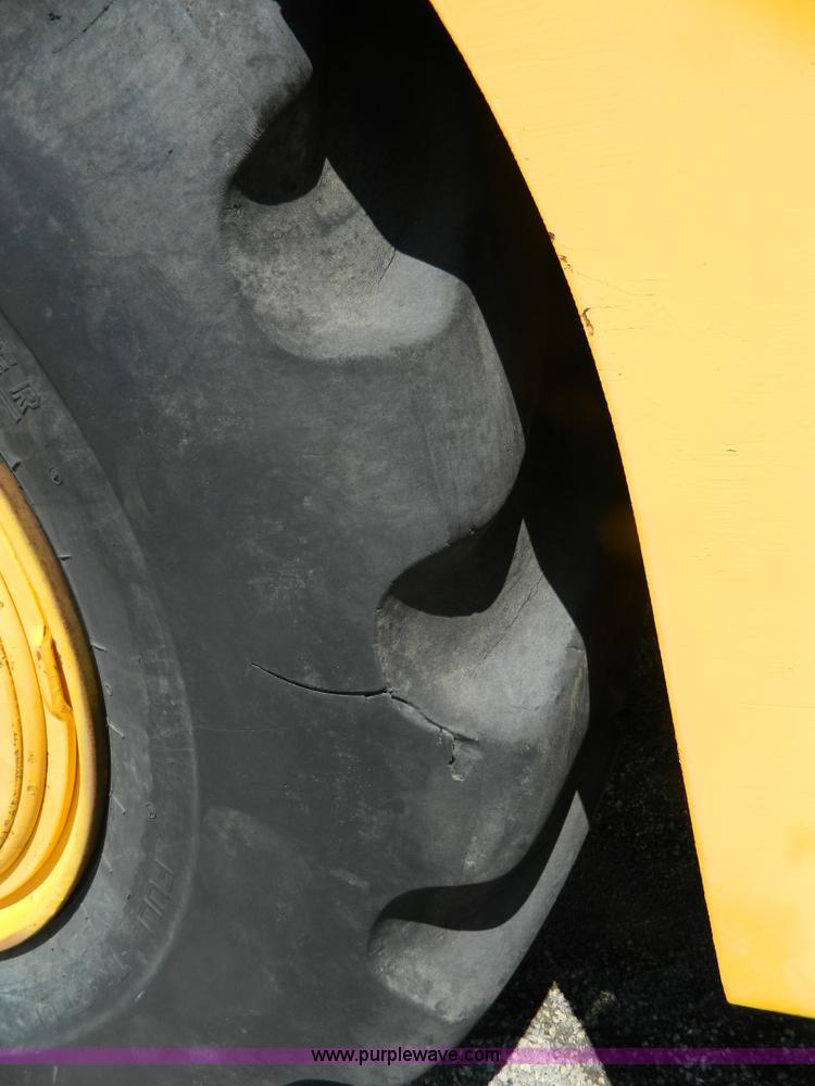 image for item AD9220 John Deere 760A paddle scraper