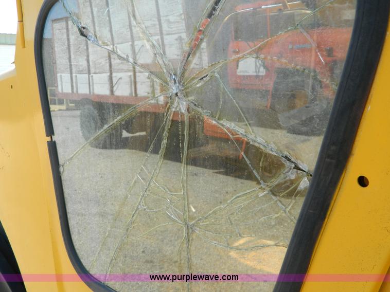 image for item AD9220 John Deere 760A paddle scraper