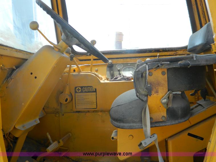 image for item AD9220 John Deere 760A paddle scraper