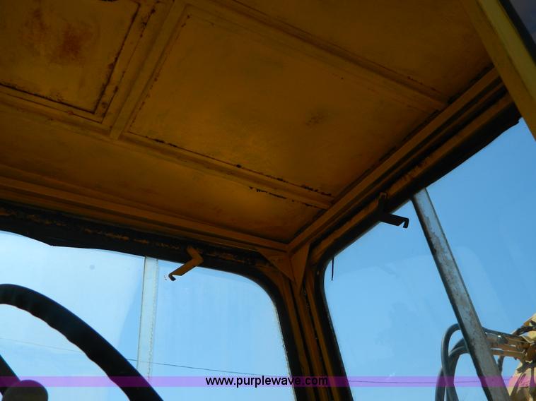 image for item AD9220 John Deere 760A paddle scraper