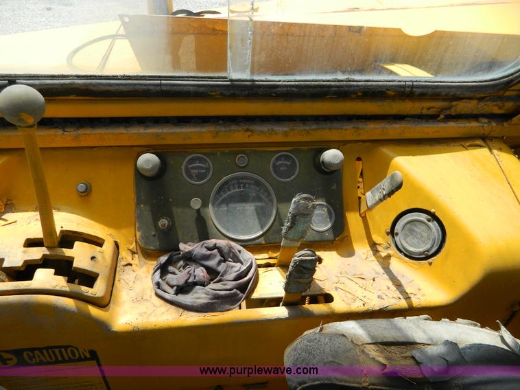 image for item AD9220 John Deere 760A paddle scraper