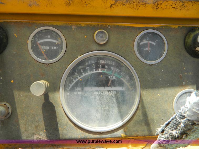 image for item AD9220 John Deere 760A paddle scraper