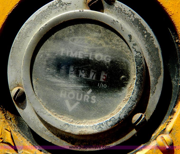 image for item AD9220 John Deere 760A paddle scraper