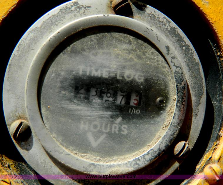 image for item AD9220 John Deere 760A paddle scraper