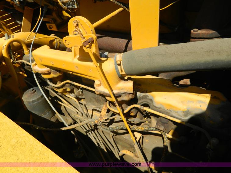 image for item AD9220 John Deere 760A paddle scraper