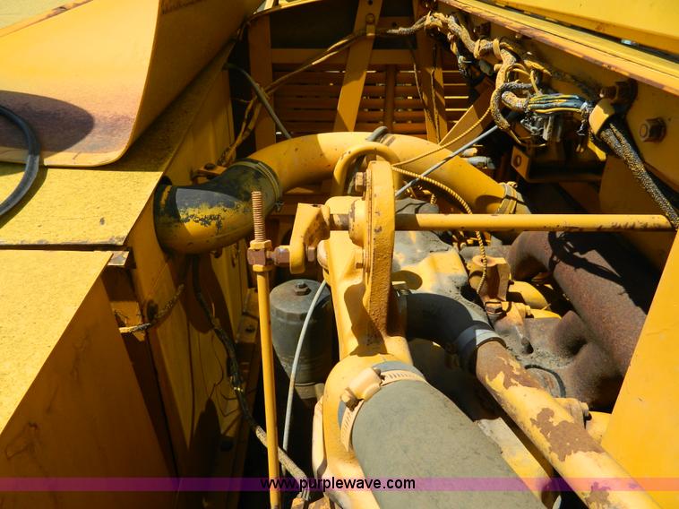 image for item AD9220 John Deere 760A paddle scraper