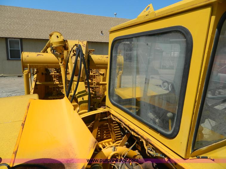 image for item AD9220 John Deere 760A paddle scraper