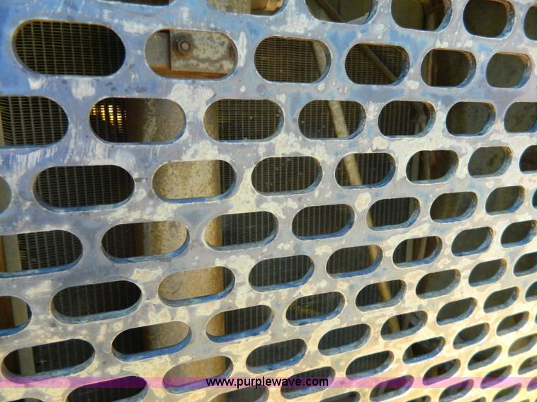 image for item AD9220 John Deere 760A paddle scraper