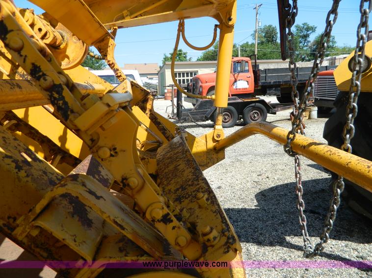 image for item AD9220 John Deere 760A paddle scraper