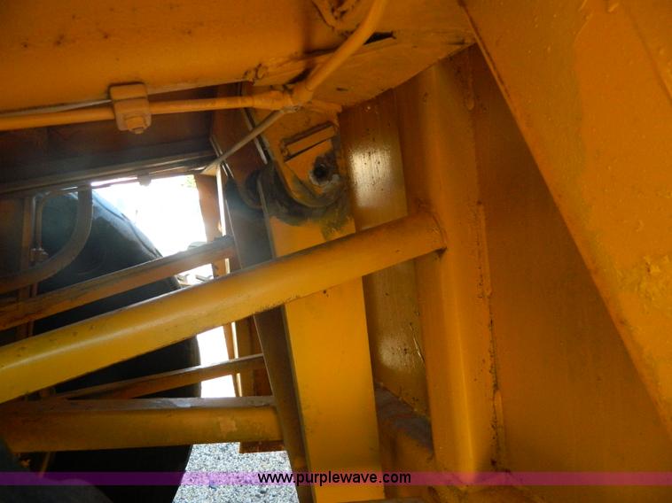 image for item AD9220 John Deere 760A paddle scraper