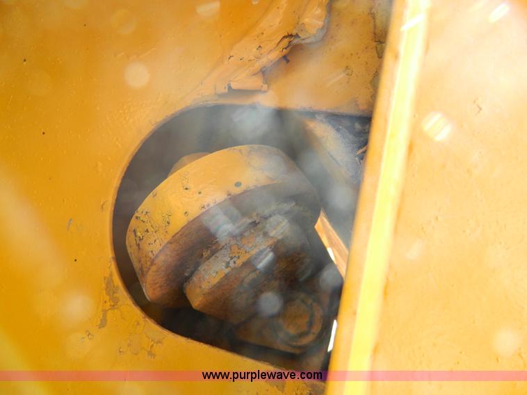 image for item AD9220 John Deere 760A paddle scraper