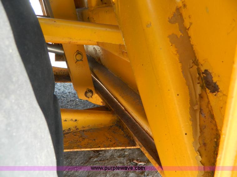 image for item AD9220 John Deere 760A paddle scraper