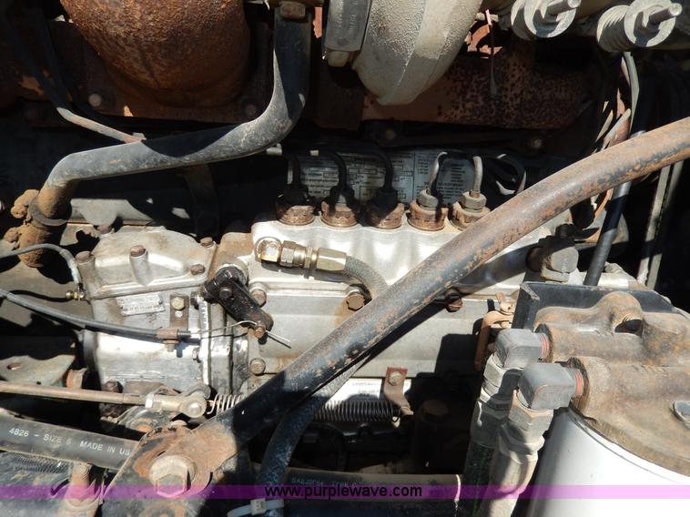 image for item D8169 1986 Mack RS686LS barrel dump truck