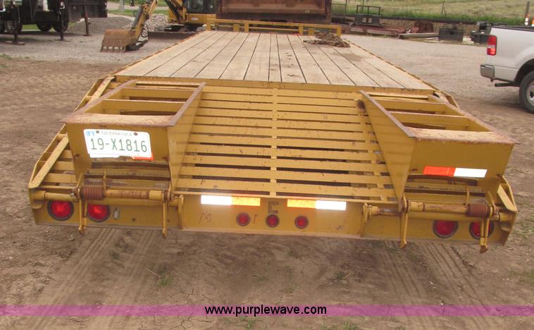 image for item F7028 2003 PJ 28'L deck over tandem axle tag trailer