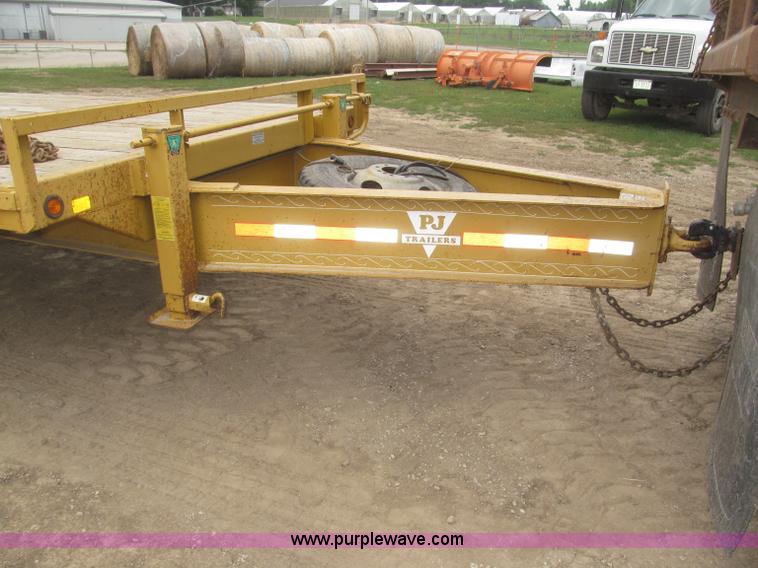 image for item F7028 2003 PJ 28'L deck over tandem axle tag trailer