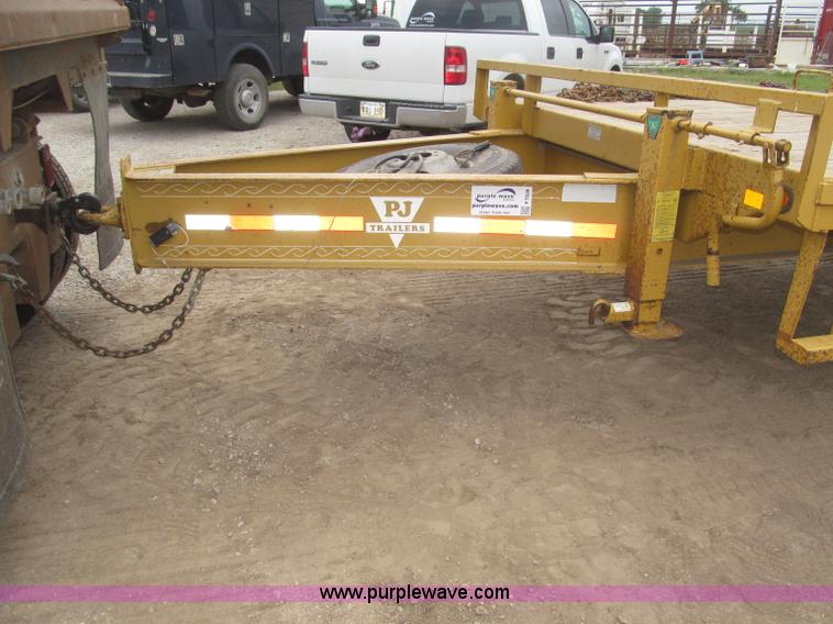 image for item F7028 2003 PJ 28'L deck over tandem axle tag trailer