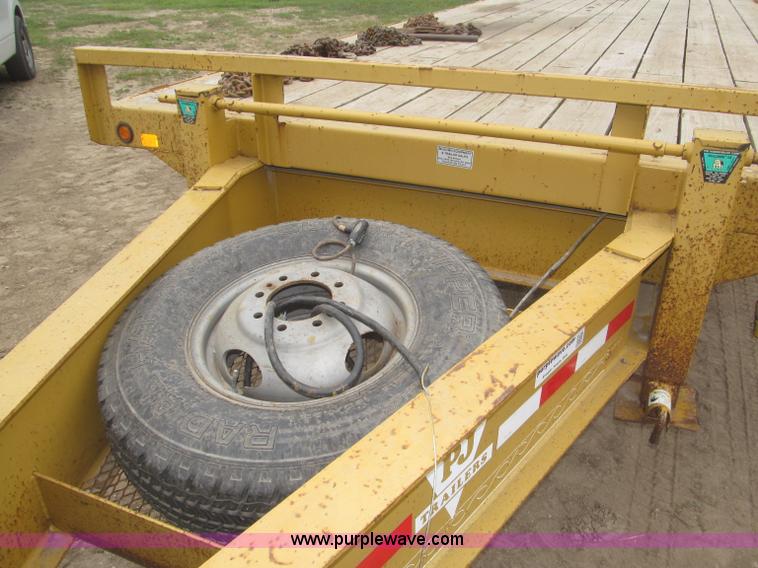 image for item F7028 2003 PJ 28'L deck over tandem axle tag trailer
