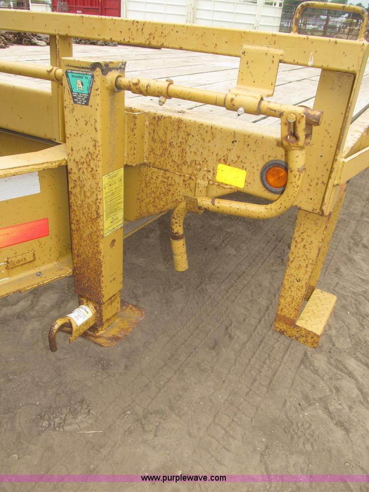 image for item F7028 2003 PJ 28'L deck over tandem axle tag trailer