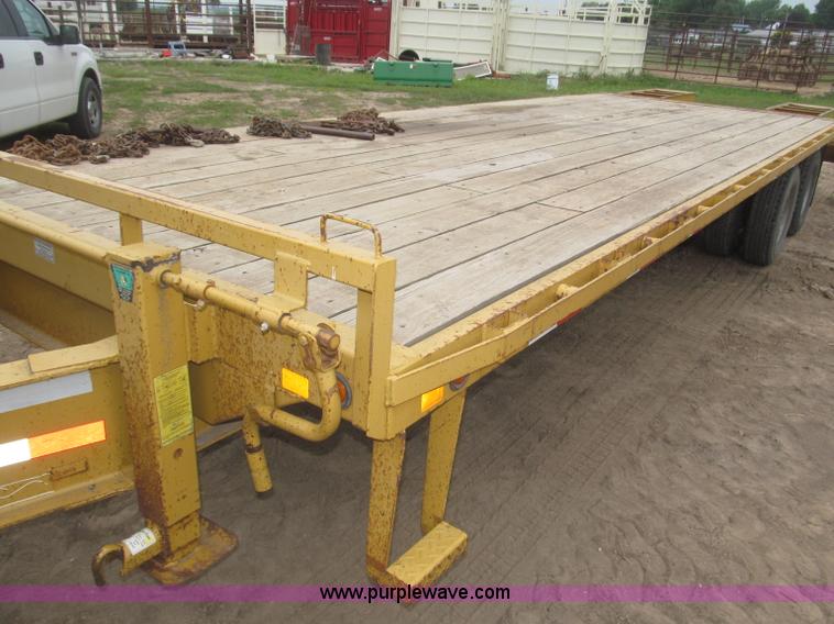 image for item F7028 2003 PJ 28'L deck over tandem axle tag trailer