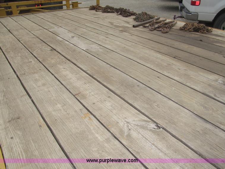 image for item F7028 2003 PJ 28'L deck over tandem axle tag trailer