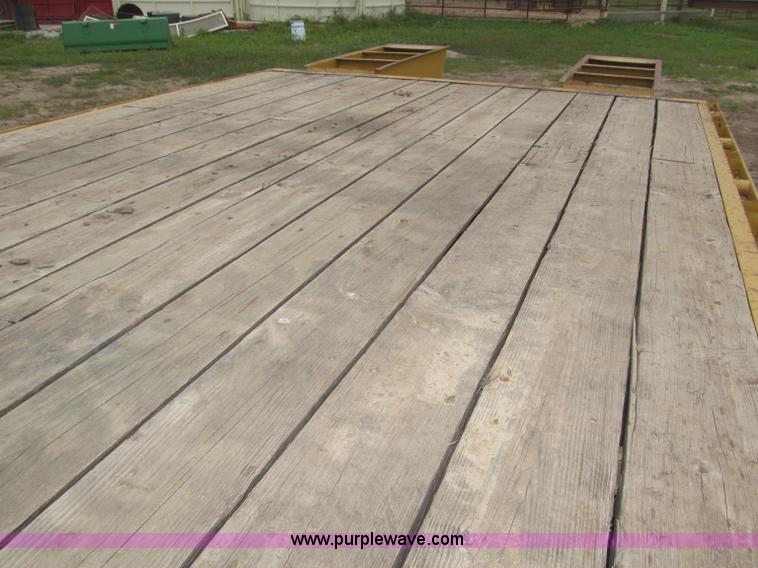 image for item F7028 2003 PJ 28'L deck over tandem axle tag trailer