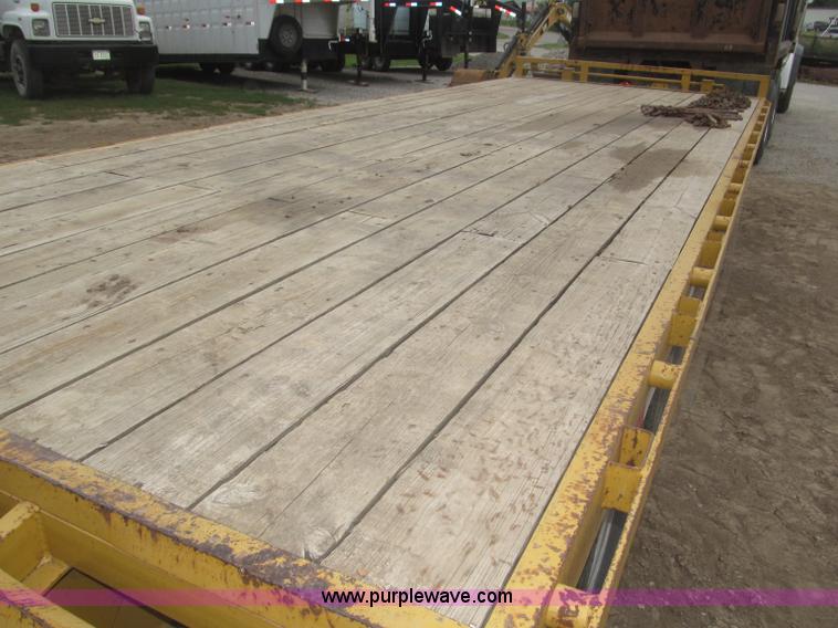 image for item F7028 2003 PJ 28'L deck over tandem axle tag trailer