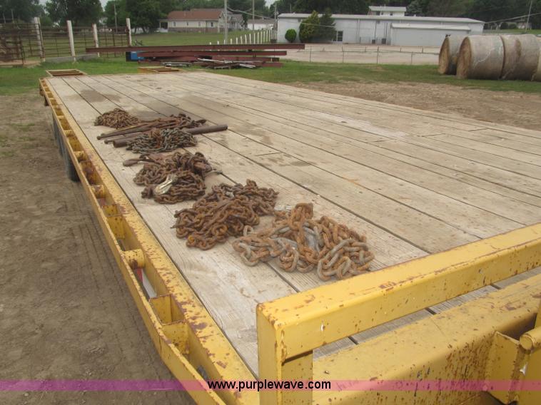 image for item F7028 2003 PJ 28'L deck over tandem axle tag trailer