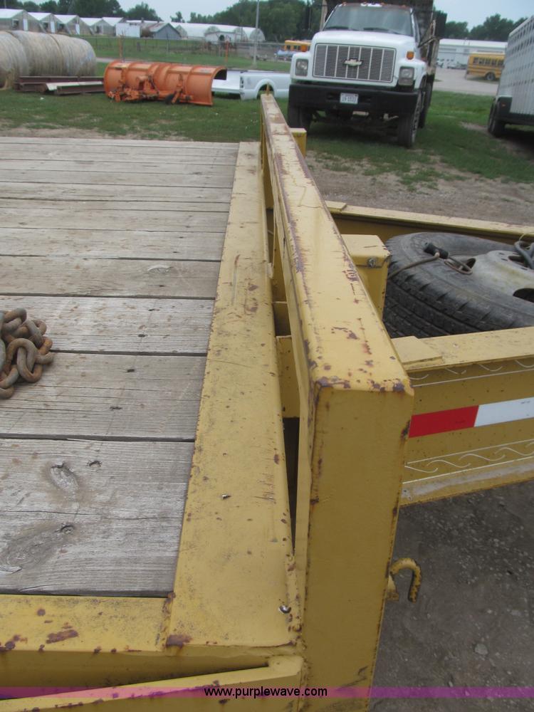 image for item F7028 2003 PJ 28'L deck over tandem axle tag trailer