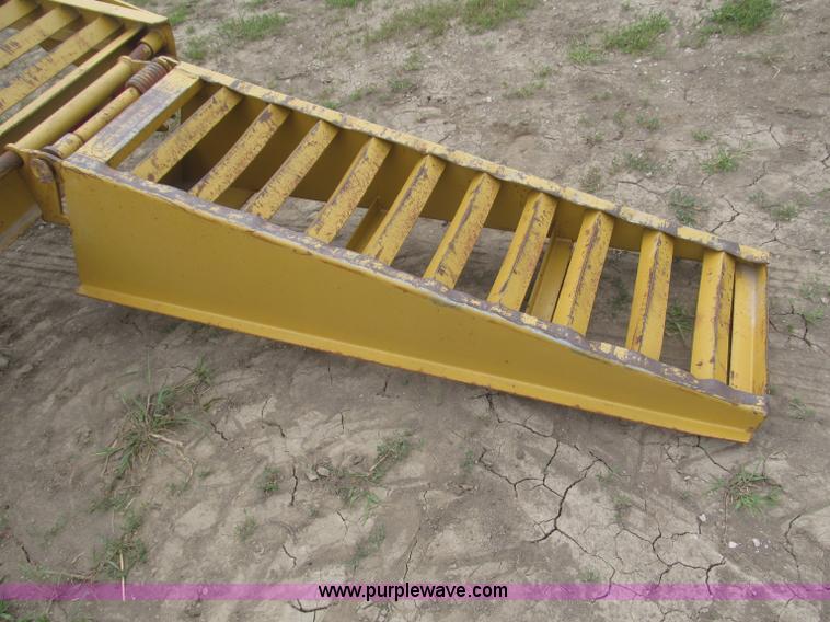 image for item F7028 2003 PJ 28'L deck over tandem axle tag trailer