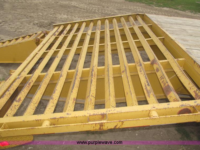 image for item F7028 2003 PJ 28'L deck over tandem axle tag trailer